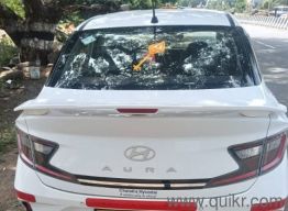 used Aura sx 1.5 cng commercial